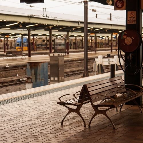 Seats at a train station platform.