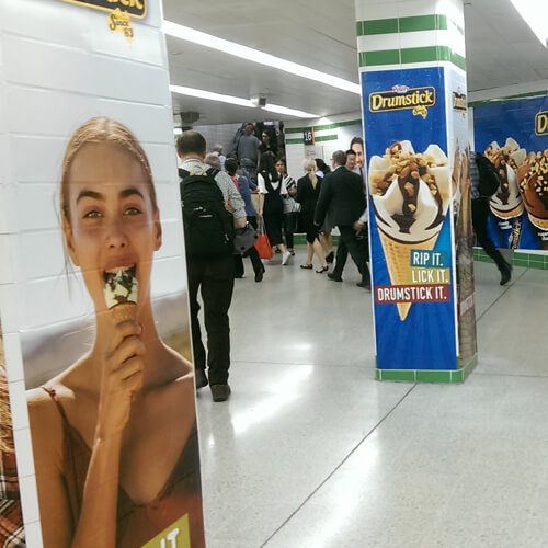 Junk food advertising in a train station.