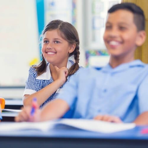 Two school students smiling