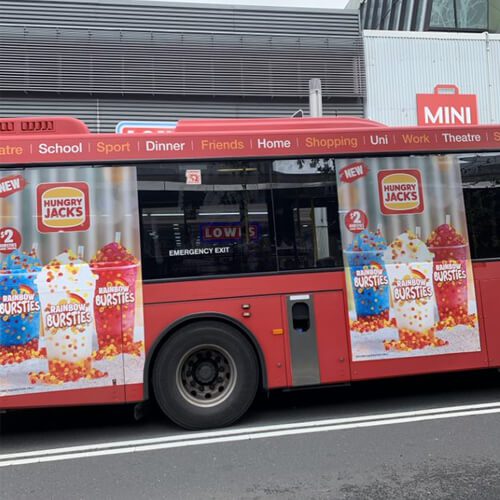 Red bus with Hungry Jacks advertisement