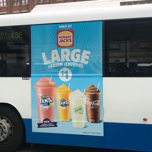 Hungry Jacks ad for frozen drinks on the side of a bus
