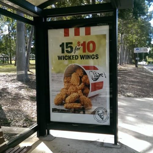 KFC advertisement on bus shelter
